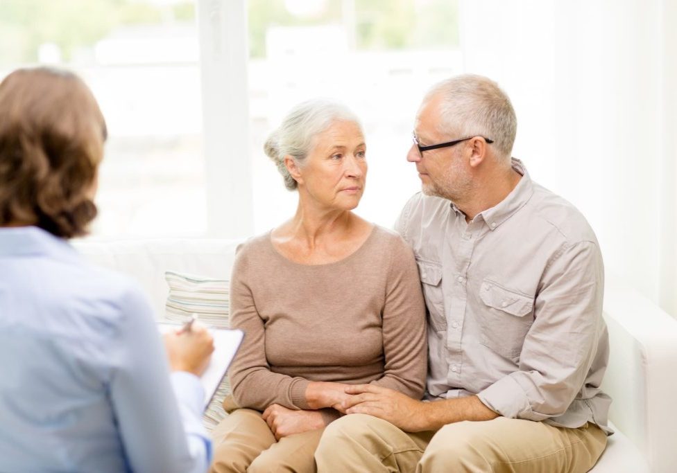 Elderly couple being counselled.