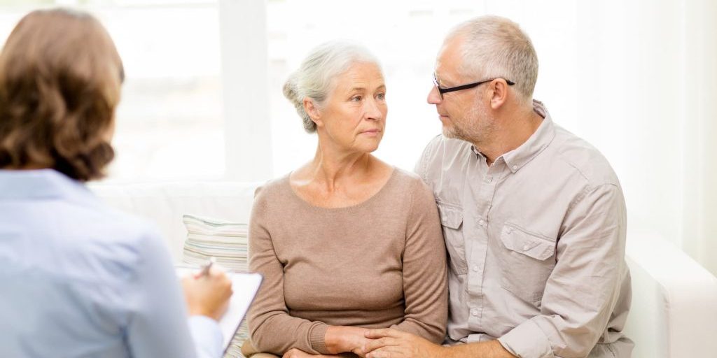 Elderly couple being counselled.